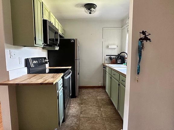View of kitchen from entry way