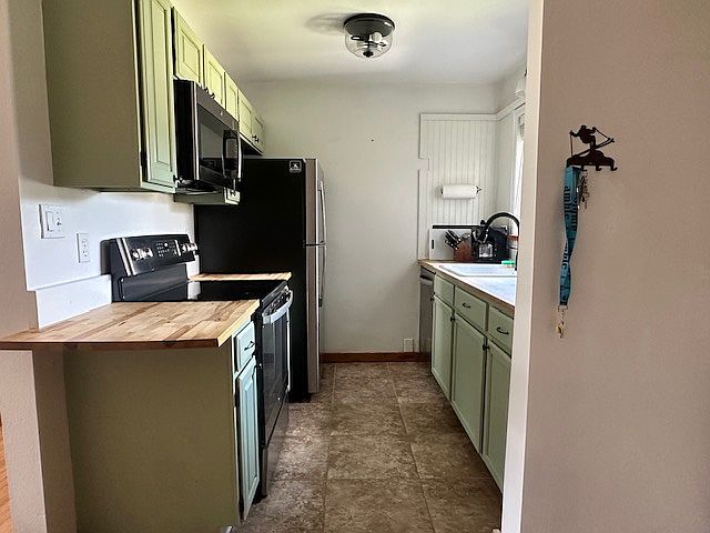 View of kitchen from entry way