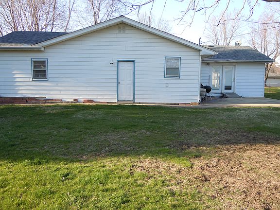 side of house in fence 