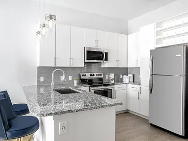 Cue Galatyn Station Apartments