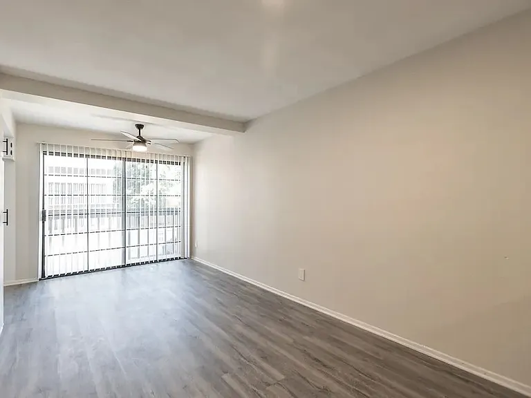 living area / dining room with view of patio looking into mountains. units vary