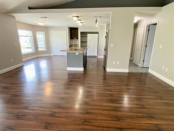 Large family/kitchen/dining combo view #4