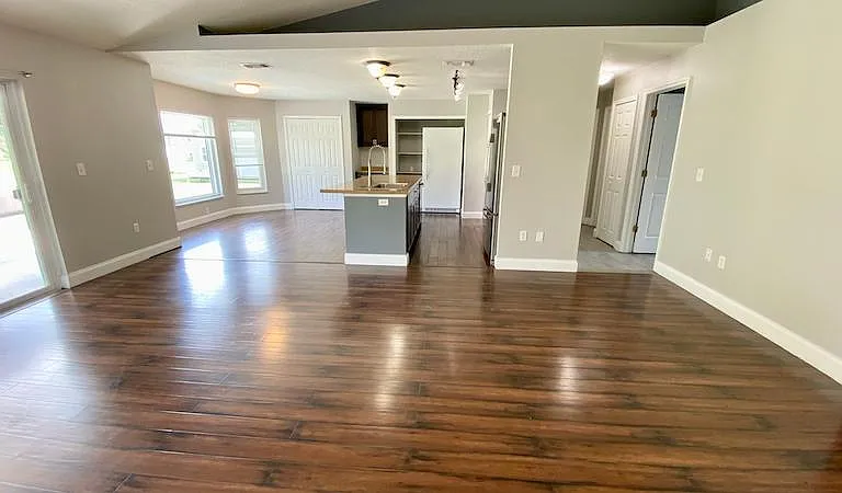 Large family/kitchen/dining combo view #4