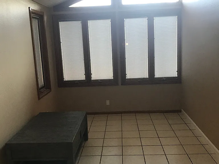 More common area space with a bench.