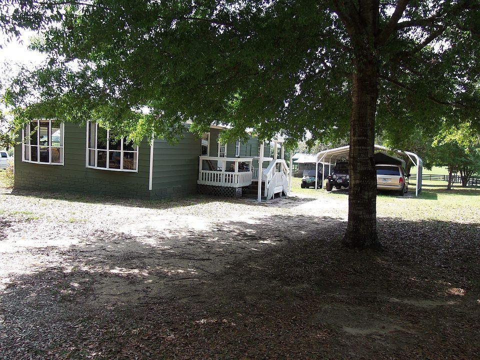 Front of Home w/Carport
