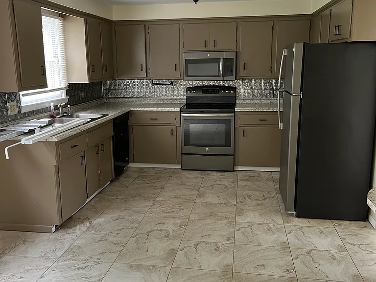 7820 Stuhldreher St NW — Photo 2