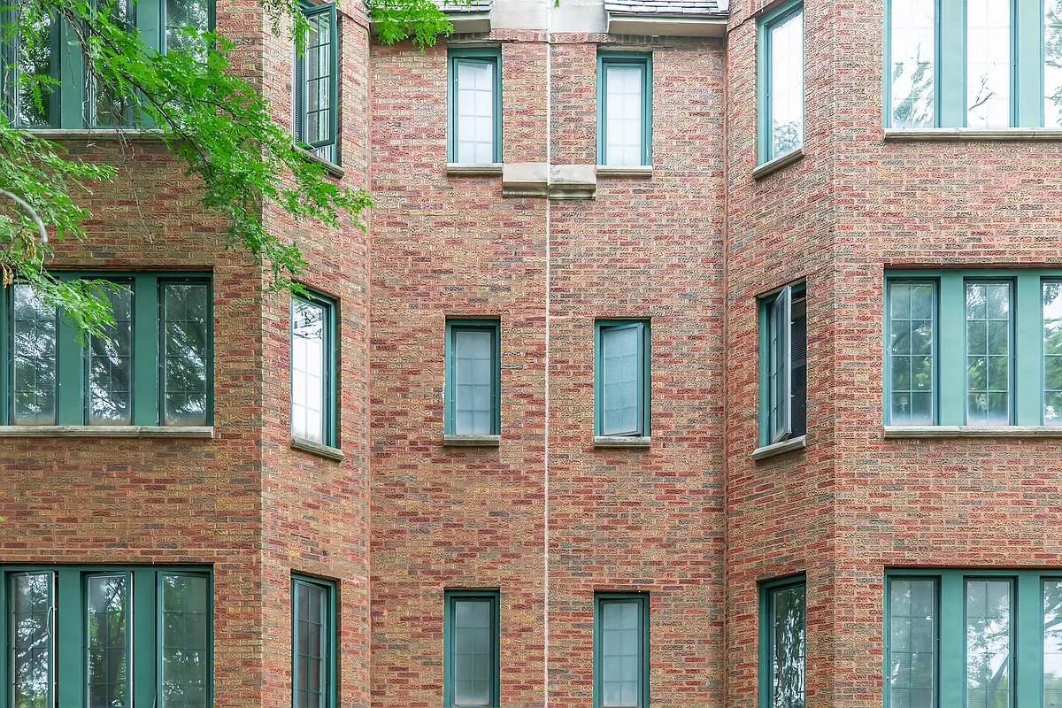 Building exterior. - Highlands Tudor Manor - A 55+ Community