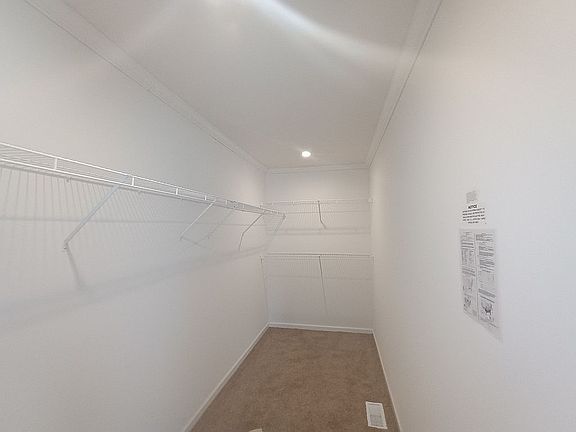 Primary bedroom huge walk in