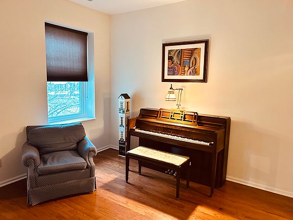 Super comfy reading/listening chair. (You are free to move around furniture as you like - this is one of many possible arrangements).)