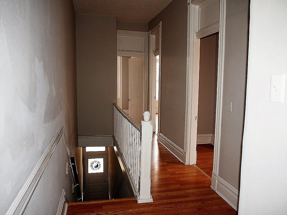 hallway way leading to downstairs
