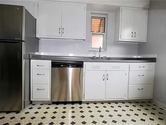 Kitchen is right off the dining room for easy entertaining.