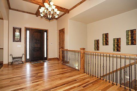 Inviting entryway with gorgeous hardwood floors
