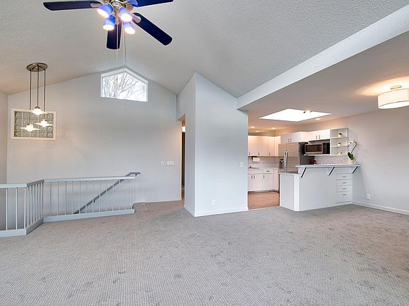 Livingroom/dining room and kitchen all very open with cathedral ceilings