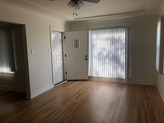 LIVINGROOM WITH 3 LARGE WINDOWS