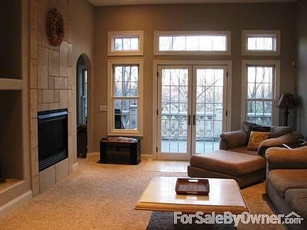 Upstairs living room
						:
						Custom travertine coffee table stays