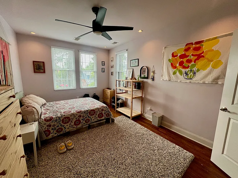 Corner bedroom with walk-in closet