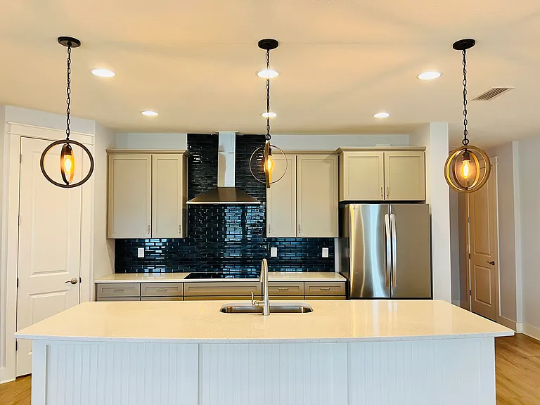 Gourmet chef's kitchen with premium finishes, spacious island, and appliances