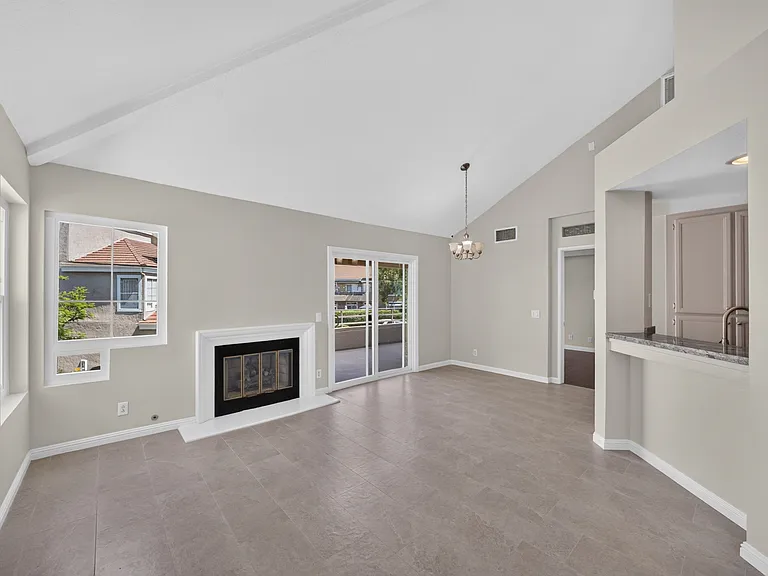 VAULTED CEILINGS, NEW PAINT, NEW WINDOWS AND OVERSIZED BALCONY. VERY OPEN FLOOR PLAN
