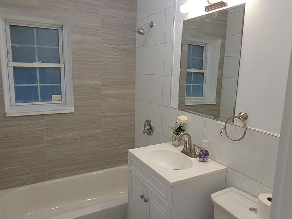 All new bathroom with designer tile and updated fixtures
