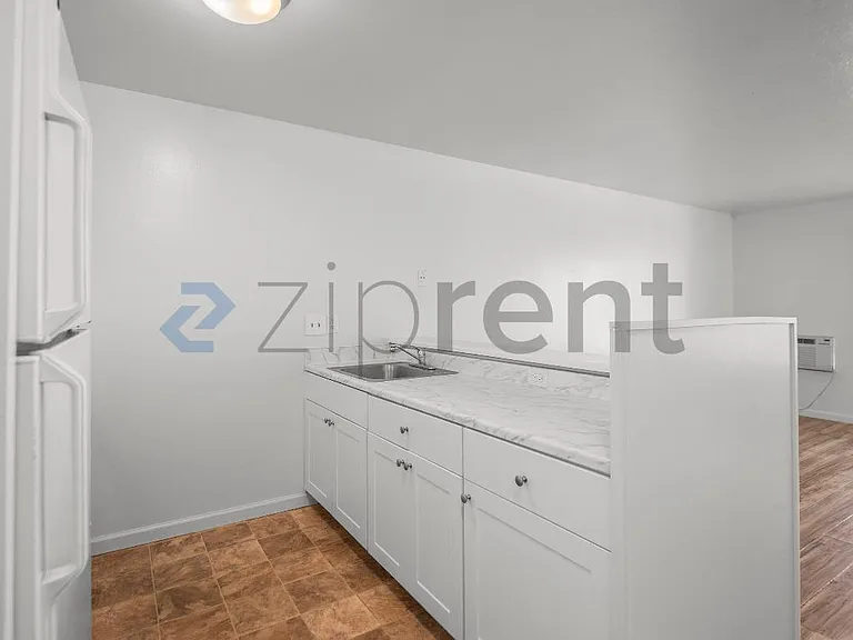 100 Village Dr #202 — Photo 13