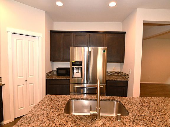 sink, pantry and refrigerator