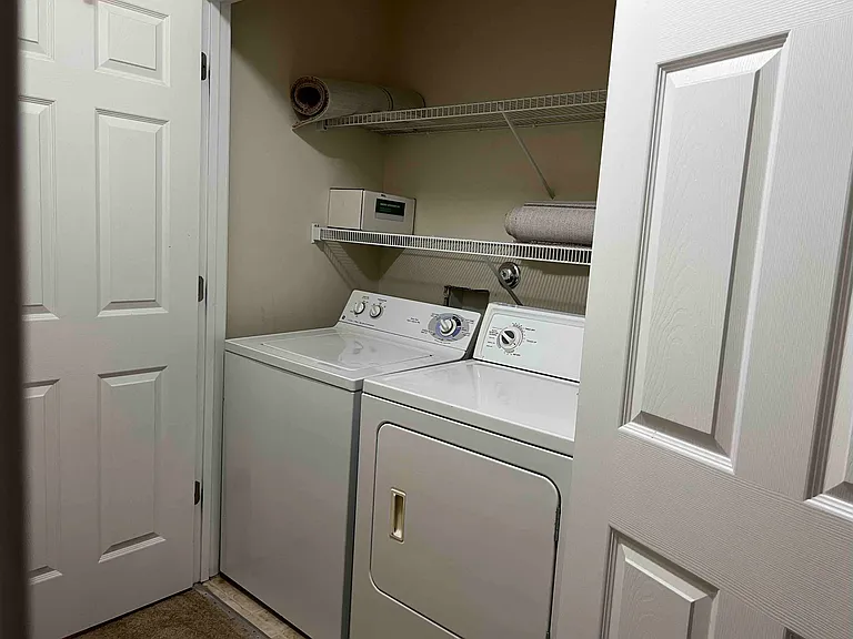 Laundry with washer and dryer on the second floor