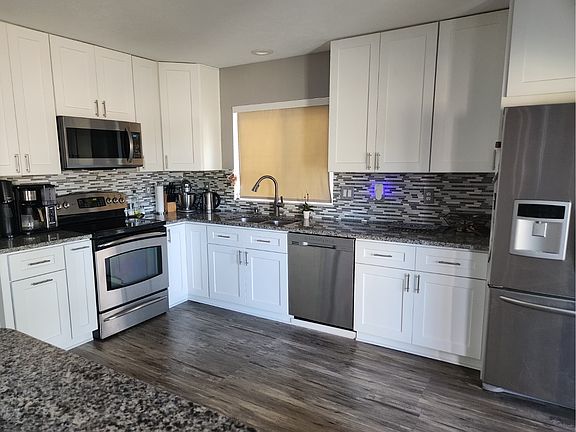 Updated kitchen with microwave and dishwasher