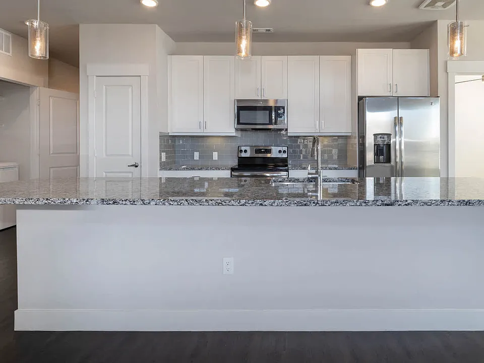Kitchen with Granite Countertops and Stainless Steel Appliances
