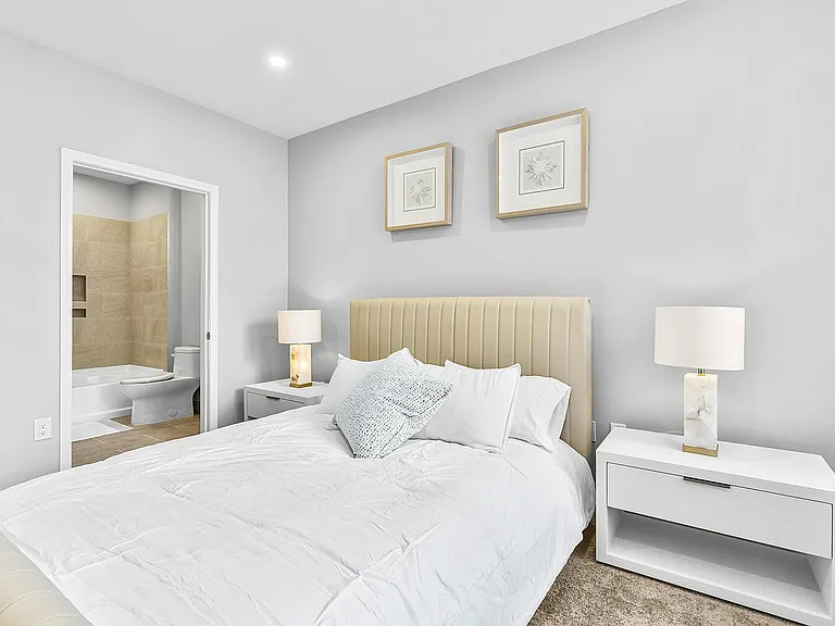 Experience serene elegance in this beautifully designed bedroom, offering both luxury and comfort.