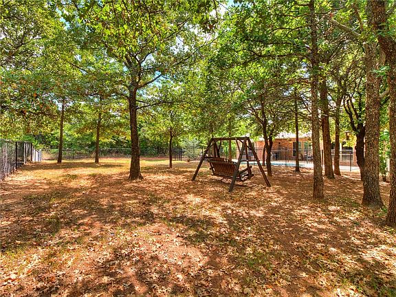 Trees cover this property providing a peaceful setting.