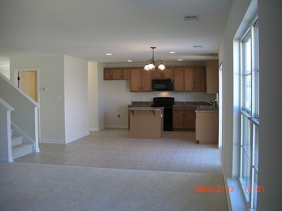 View from near FP in Great Room into eat-in kitchen