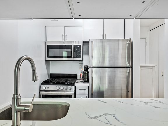 5th image of 393 W 49th St APT 2I