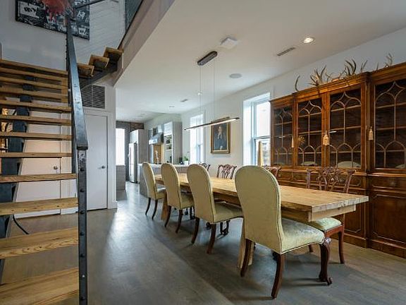View of dining room with library/China hutch