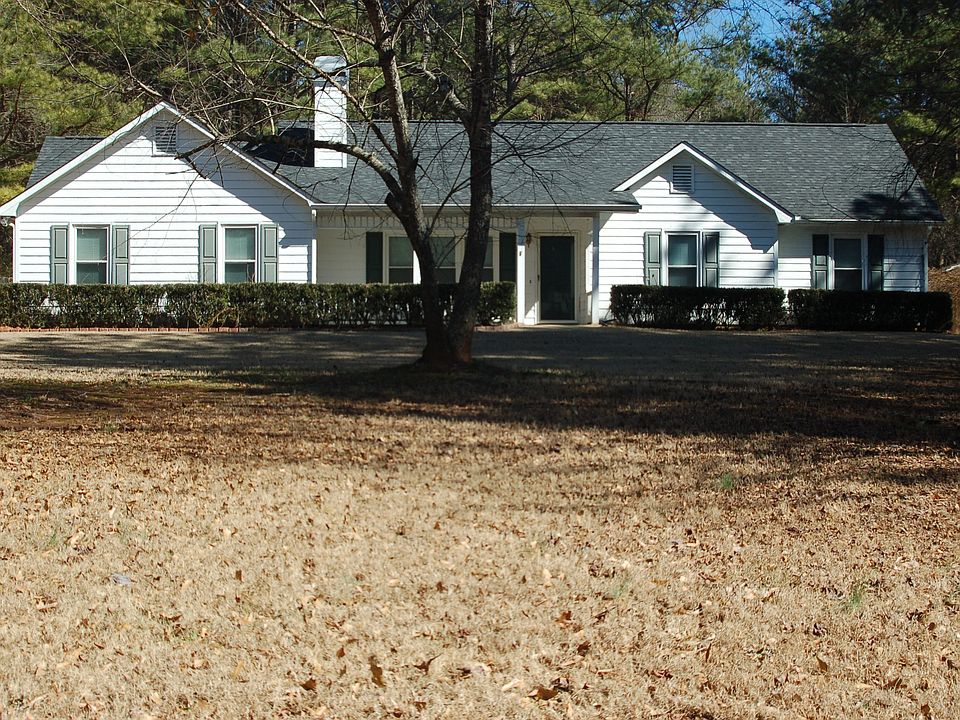 Front view of the house set back from the street