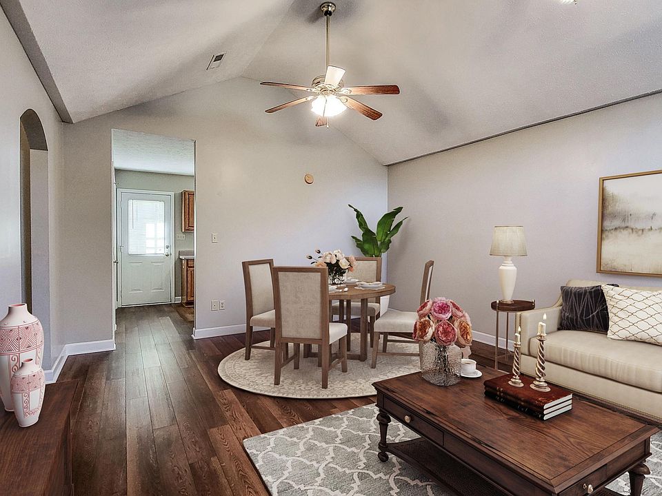 Dining/Living room combo (photo virtually staged)