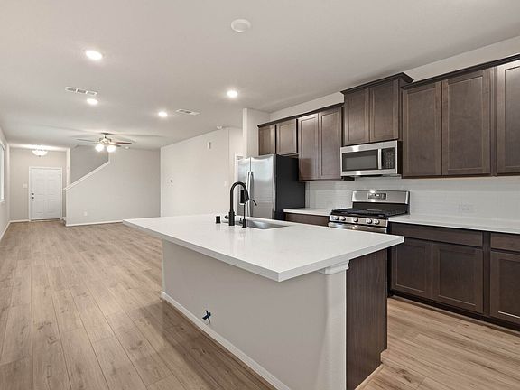 This kitchen is not only a functional space but also has ample storage. Whether you re a seasoned ch