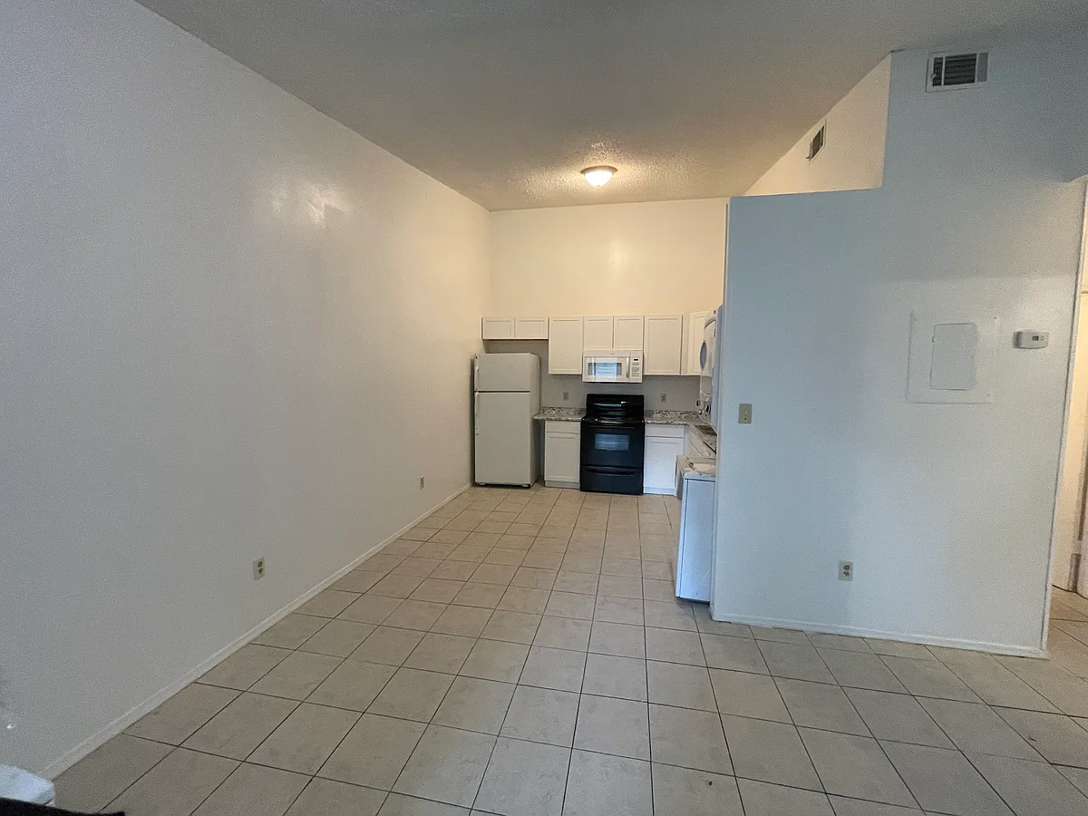 Building Photo - 6832 Tiki Ln #4