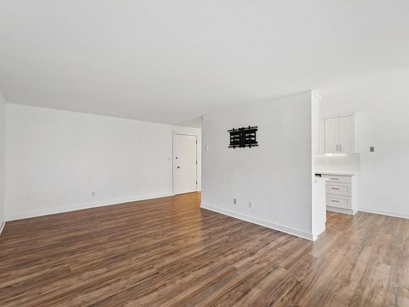 View of living room toward front door