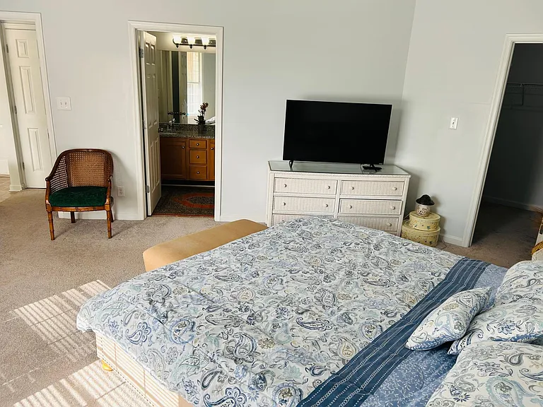 Bedroom with large walk-in closet,king size bed