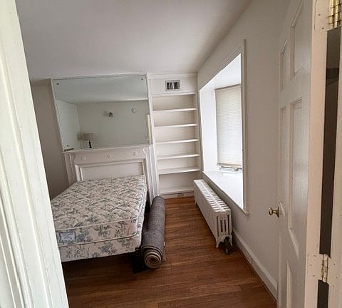 This bed in one of four bedrooms upstairs may remain for residents' use.
