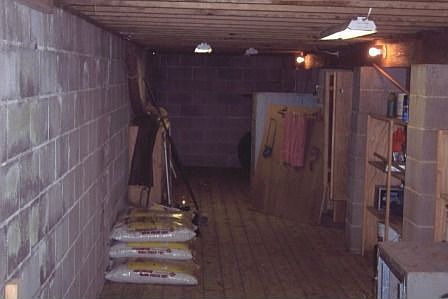 Storage & work room below the house