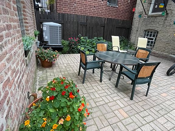 courtyard outside the coach house door
