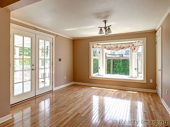 Dining room with french doors to covered porch