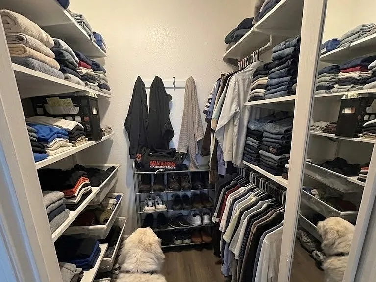 Master closet, includes closet organizer.