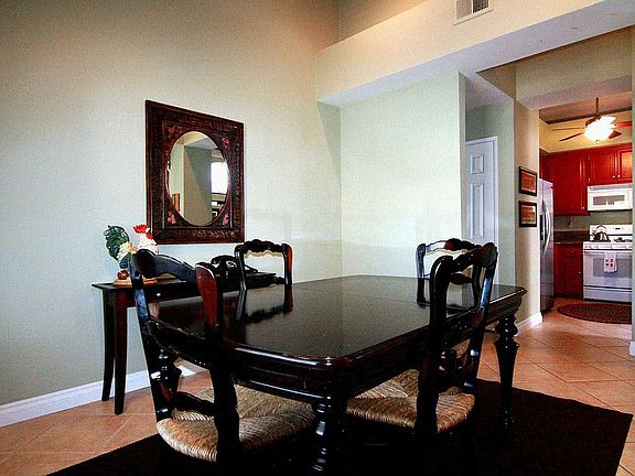 Formal spacious dining room with vaulted ceilings
