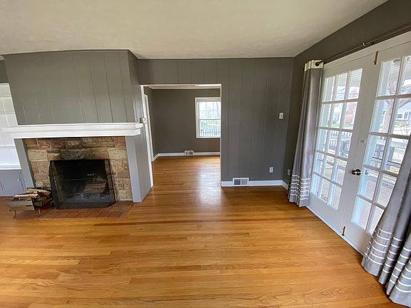 living room with entrance to dining room
