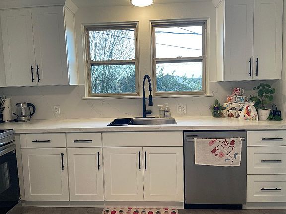 Large sink with outdoor view