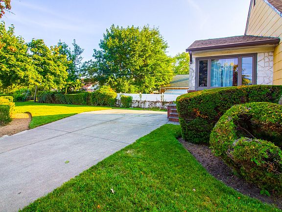 View of Driveway and Yard
