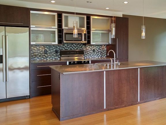 Modern kitchen with stainless steel appliances