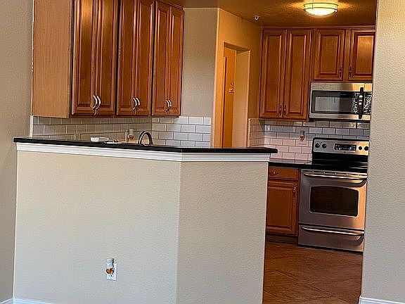 2nd image of 5772 S Addison Way #30-C